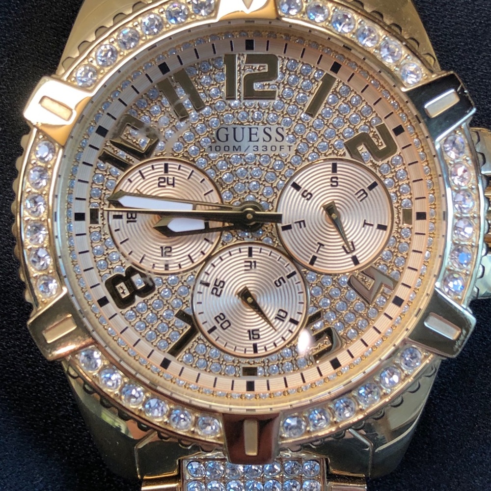 Men’s Guess Gold tone Diamond Accent Watch.